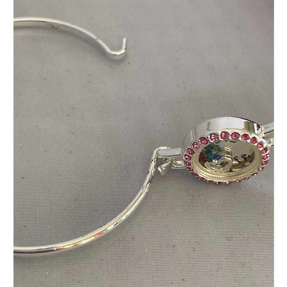 Bangle bracelet silver tone, pink rhinestones‎